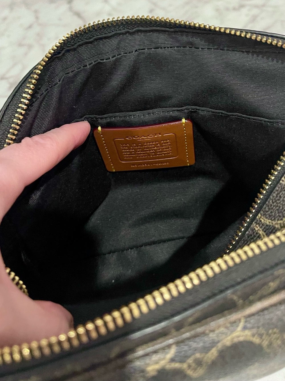 Carey Crossbody Bag
In Loved Signature Canvas With Charms - Picture 10 of 16